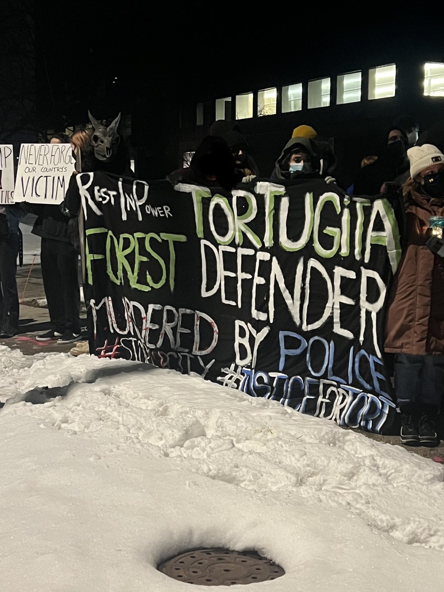 Ann Arbor: Protest to Stop Cop City staged at Merrill Lynch and Porsche; Tortugita Remembered